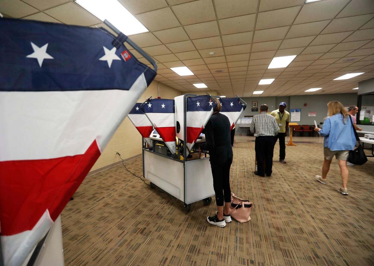 A voter can be seen participating in early voting for the Mayoral race at Second Baptist Church in Memphis, Tenn. on Friday, September 15, 2023.