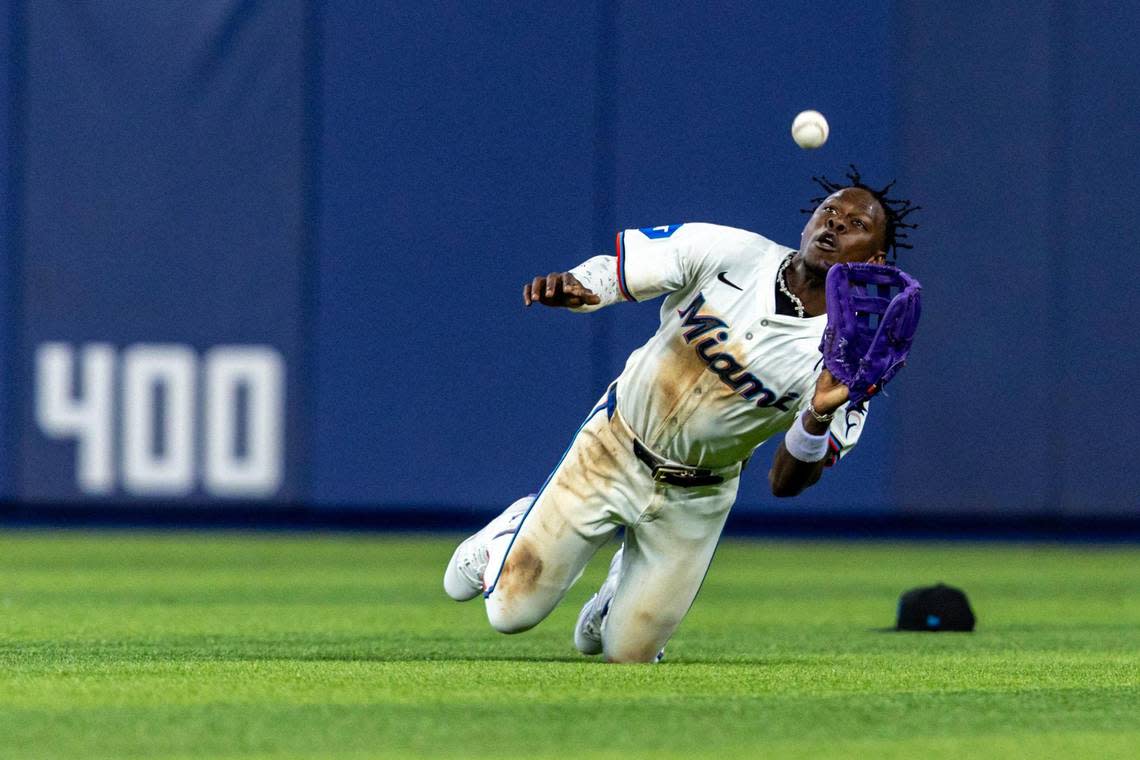 Miami Marlins center fielder Jazz Chisholm Jr. (2) makes a catch in the outfield for an out during the seventh inning of an MLB game on opening day against the Pittsburgh Pirates at LoanDepot Park in Miami, Florida, on Thursday, March 28, 2024. D.A. Varela/dvarela@miamiherald.com