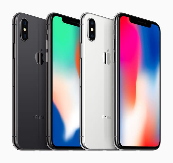 Front and rear views of the iPhone X in silver and space gray colors