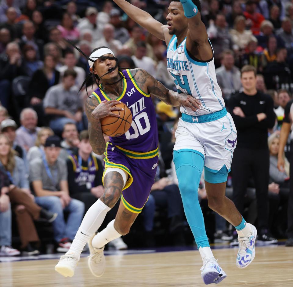 Utah Jazz guard Jordan Clarkson (00) drives around Charlotte Hornets forward Brandon Miller (24) in Salt Lake City on Thursday, Feb. 22, 2024. The Hornets won 115-107. | Jeffrey D. Allred, Deseret News