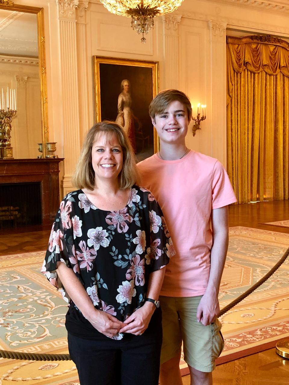 Kimberly M. Baker and her son Seth touring the White House in 2019.