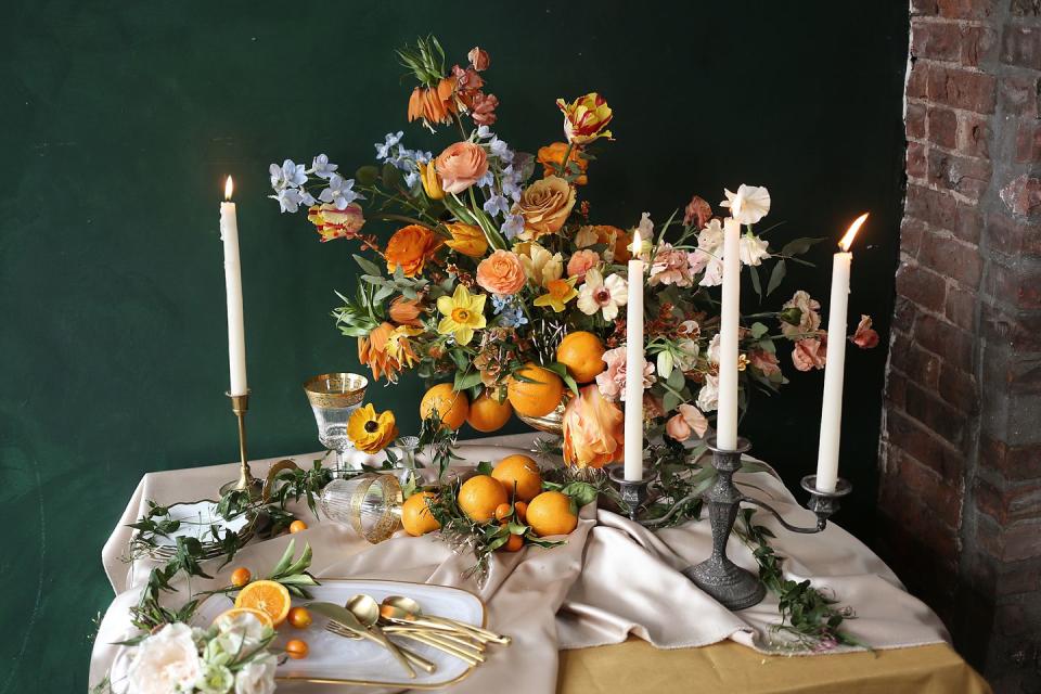 <p>Freeze: Step away from the mason jars and twine. Trade the over-used Pinterest faux pas for fresh fruit–like citrus in rich <a rel="nofollow noopener" href="https://www.harpersbazaar.com/wedding/planning/g12092021/fall-wedding-color-ideas/" target="_blank" data-ylk="slk:ochre hues;elm:context_link;itc:0;sec:content-canvas" class="link ">ochre hues</a> or deeper toned figs, pomegranates and grapes. Thoughtful <a rel="nofollow noopener" href="https://www.harpersbazaar.com/wedding/planning/a9995043/spring-wedding-tablescape-ideas/" target="_blank" data-ylk="slk:floral arrangements;elm:context_link;itc:0;sec:content-canvas" class="link ">floral arrangements</a> (like these gestural ones or those in domed glass cloches) make these undeniably of this season. Stick to evergreen and seasonal produce, for color-rich centerpieces. Pro tip: incorporate those same fruits into your locally-sourced menu for your wedding reception or after-party to give your guests a multi-sensory, seasonal experience.</p>