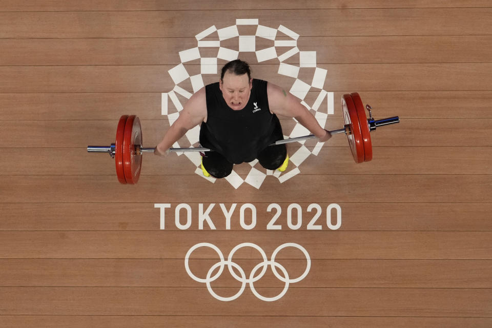 Laurel Hubbard of New Zealand competes in the women's +87kg weightlifting event at the 2020 Summer Olympics, Monday, Aug. 2, 2021, in Tokyo, Japan. (AP Photo/Luca Bruno)