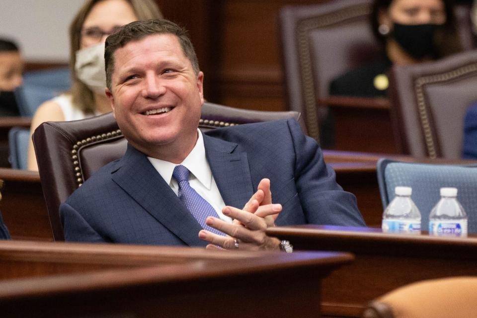 Sen. Jeff Brandes smiles as Senate President Wilton Simpson addresses him during a speech on the first day of the 2021 Legislative Session at the Capitol Tuesday, March 3, 2021.