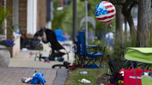 PHOTO: Chairs, bicycles, strollers and balloons were left behind at the scene of a mass shooting on the Fourth of July parade route along Central Avenue in Highland Park, Ill., July 4, 2022.  (Brian Cassella/Chicago Tribune via Getty Images)