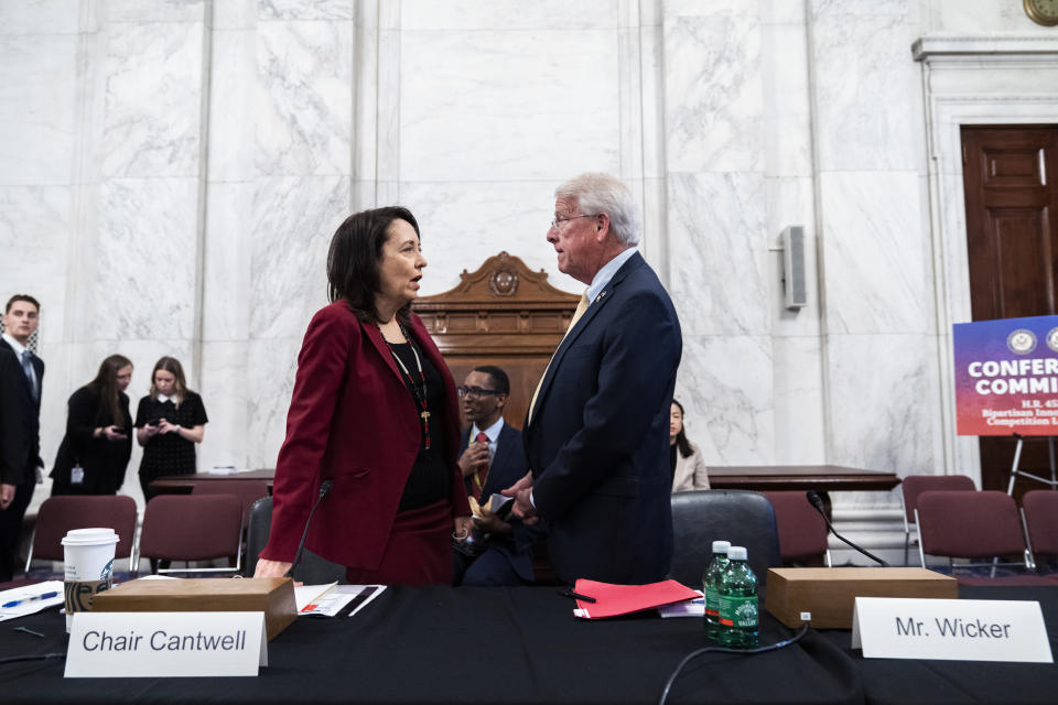 UNITED STATES - MAY 12: Sen. Maria Cantwell , D-Wash., chair of the Senate Commerce, Science, and Transportation Committee talks with ranking member Sen. Roger Wicker, R-Miss., before the Conference Committee on H.R. 4521, bipartisan innovation and competition legislation, in Russell Building on Thursday, May 12, 2022. The committee is tasked with reconciling the differences between the Senates United States Innovation and Competition Act (USICA) and the Houses America COMPETES Act. (Tom Williams/CQ-Roll Call, Inc via Getty Images)