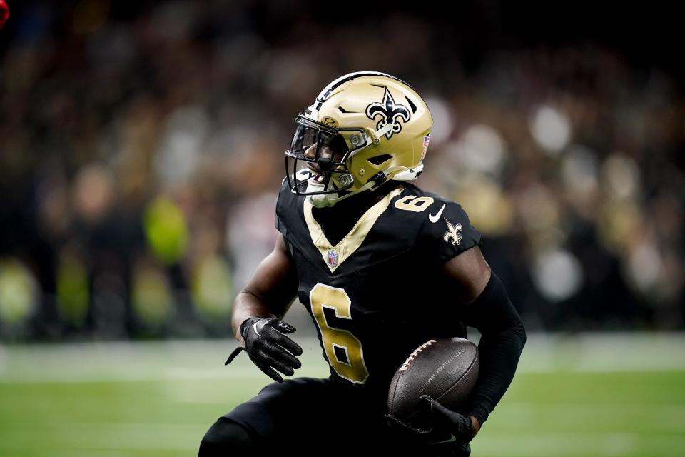 New Orleans Saints safety Marcus Maye reacts after intercepting a Tennessean Titans pass.