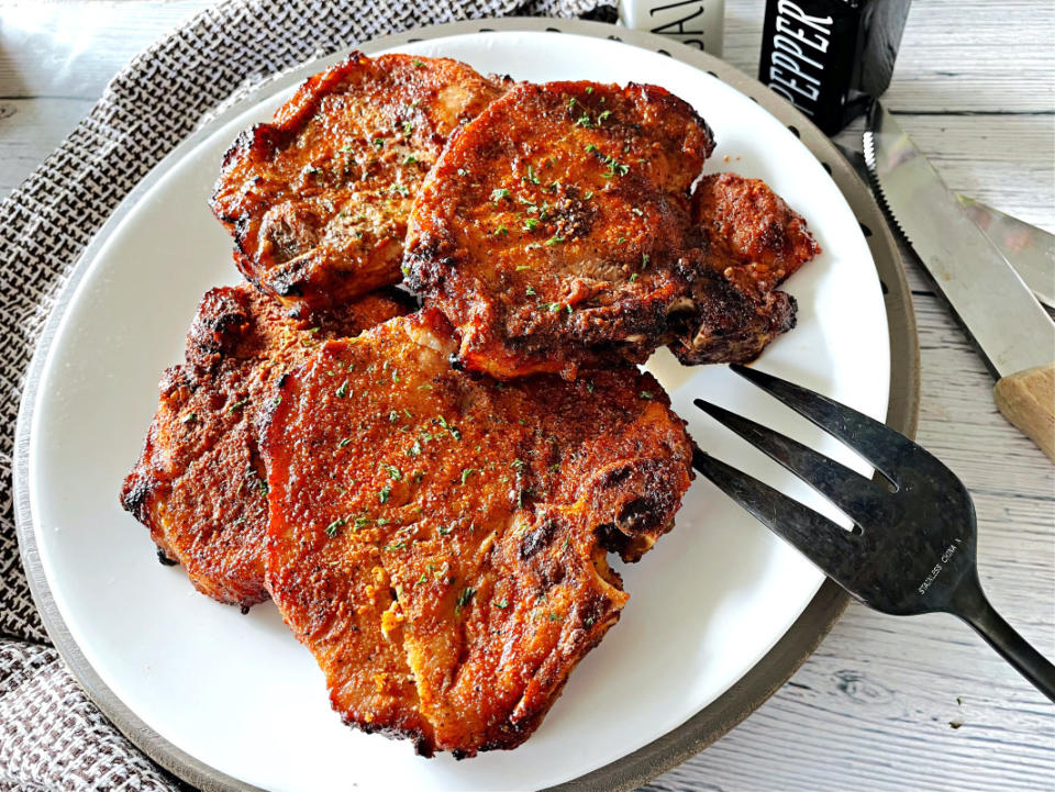 <p>Krista Marshall</p><p>Let your air fryer help out this summer if it's too hot to stand over the grill or you run out of propane.</p><p><strong>Get the recipe: <a href="https://www.yahoo.com/lifestyle/air-fryer-key-juicy-flavorful-210703446.html" data-ylk="slk:Air Fryer Pork Chops;elm:context_link;itc:0;sec:content-canvas;outcm:mb_qualified_link;_E:mb_qualified_link;ct:story;" class="link  yahoo-link">Air Fryer Pork Chops</a></strong></p>