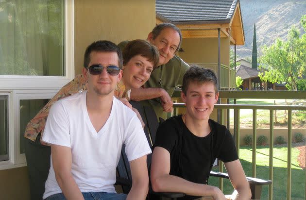 The author with Dennis, her late husband, and their sons in 2012.