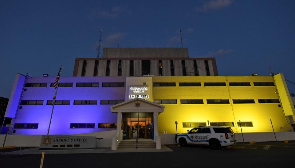 Tuscaloosa City Hall and the Tuscaloosa County Sheriff's Office display colors in support of Ukraine Sunday, March 6, 2022.