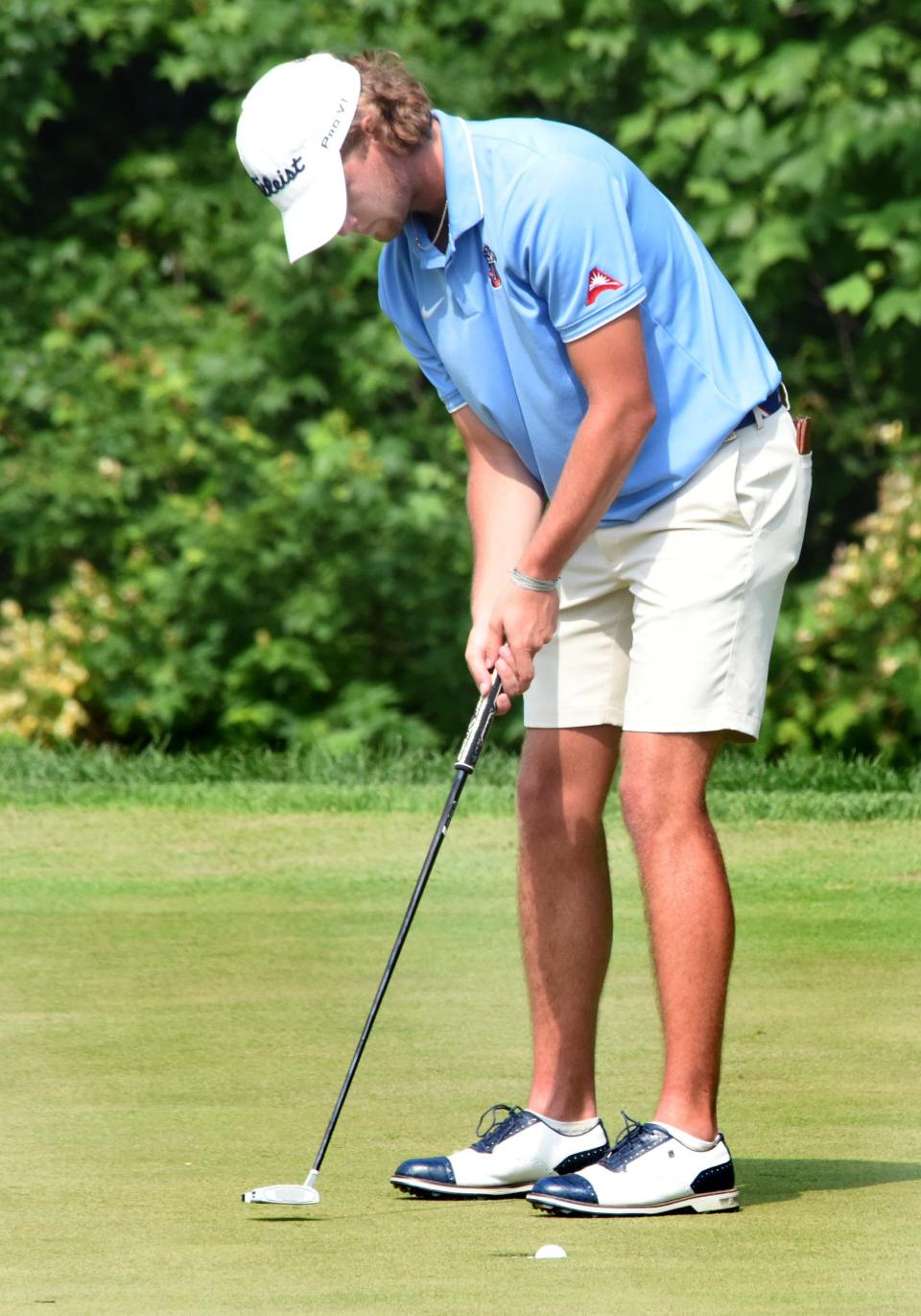 Evan Barbin of Red Lion Christian, the DHSGCA Boys Golfer of the Year, holes his final putt during the DIAA Golf Tournament on June 1 at Odessa National Golf Club.