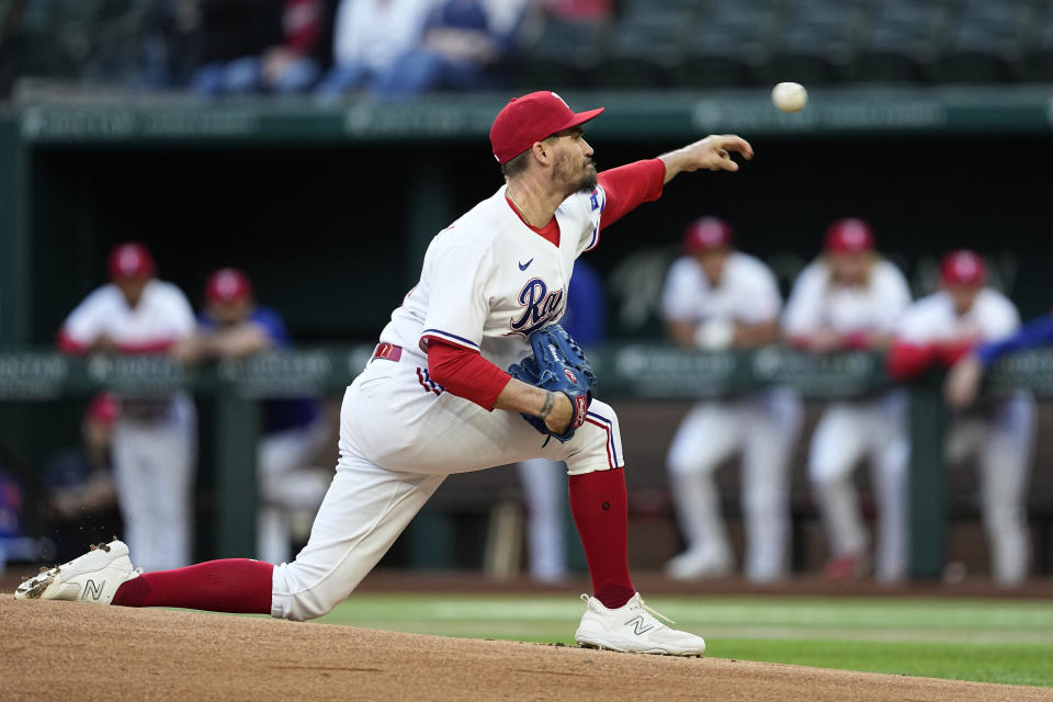 Texas Rangers starting pitcher Andrew Heaney throws to a New York Yankees batter during the first inning of a baseball game Thursday, April 27, 2023, in Arlington, Texas. (AP Photo/Tony Gutierrez)