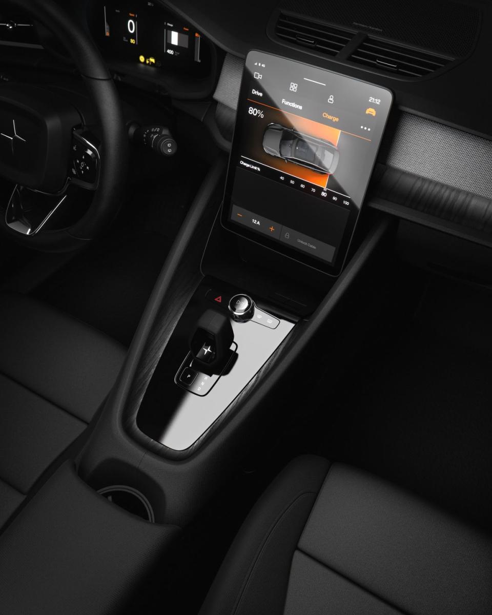 <p>The only physical controls besides those on the steering wheel are a volume knob, buttons for the windshield and rear-window defrosters, and the shift lever. </p>