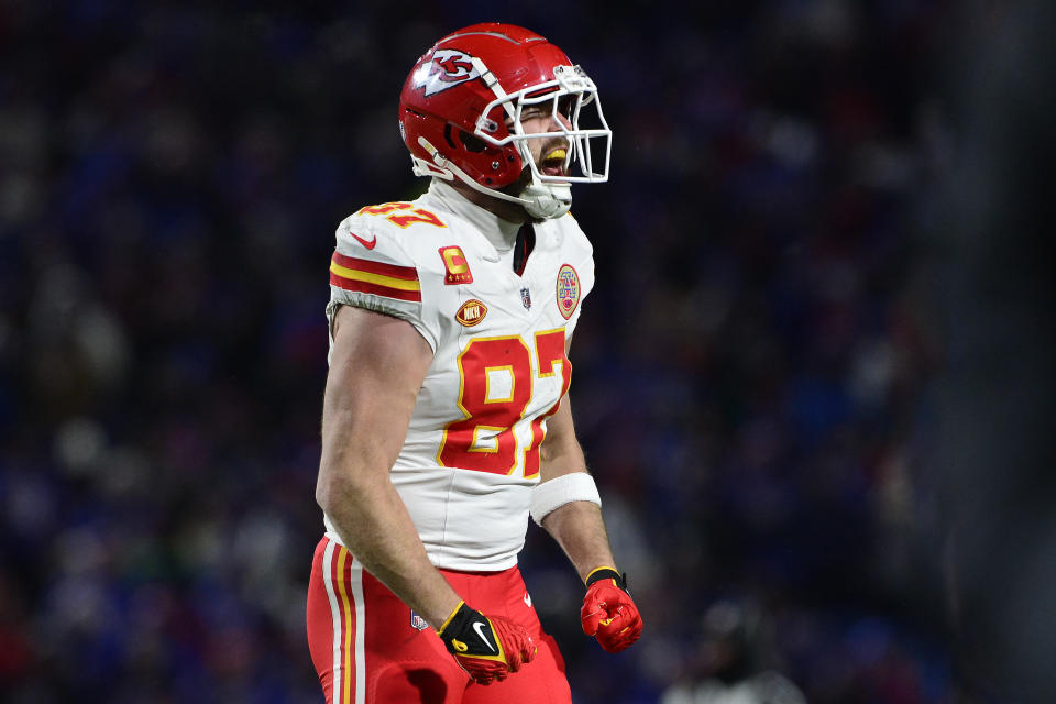 Kansas City Chiefs tight end Travis Kelce (87) reacts after defeating the Buffalo Bills in an NFL AFC division playoff football game, Sunday, Jan. 21, 2024, in Orchard Park, N.Y. (AP Photo/Adrian Kraus)