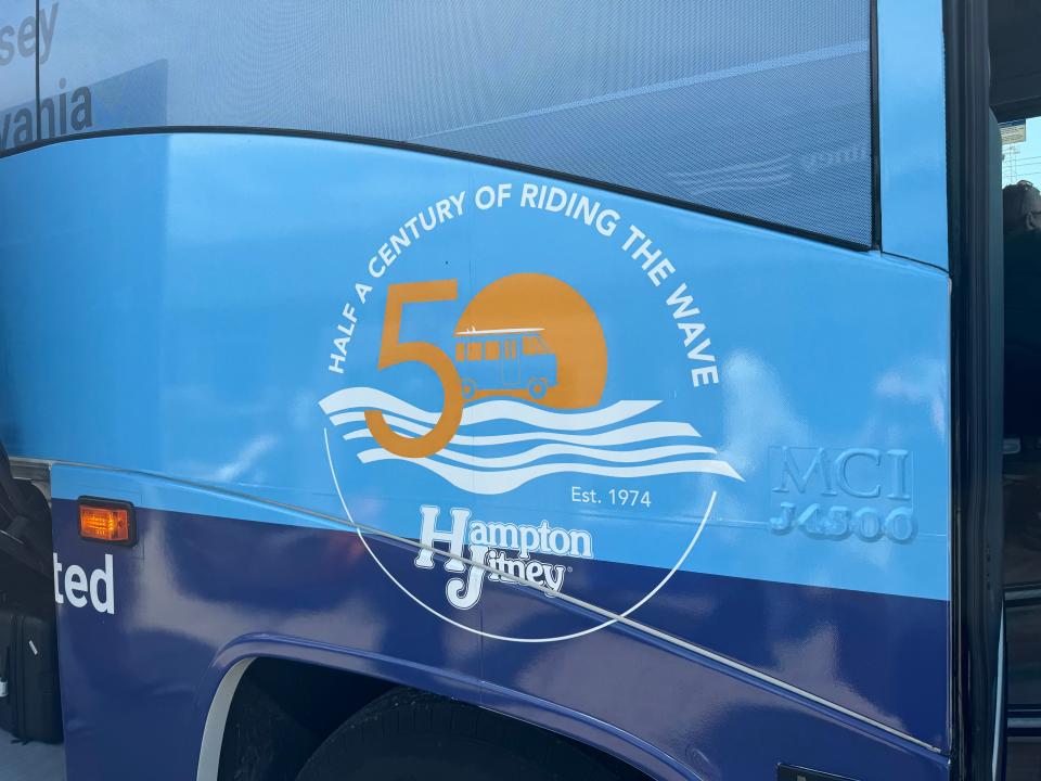 closeup shot of the logo on the side of the hamptons jitney bus