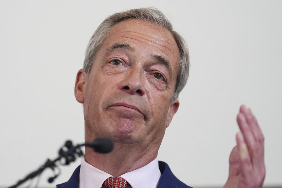 Britain's Reform UK leader Nigel Farage speaks to the media during a press conference in central London, Friday June 14, 2024, while on the General Election campaign trail. (James Manning/PA via AP)