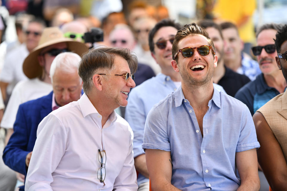 Ron Nyswaner and Robbie Rogers laugh during star dedication ceremony in Palm Springs