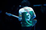 Jack White wearing jersey of his high school alma mater