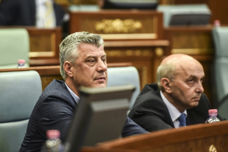 Kosovo's Prime Minister Isa Mustafa (R) and Kosovo's Foreign Minister Hashim Thaci attend a parliamentary session in Pristina on August 3, 2015