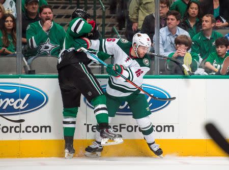 Apr 14, 2016; Dallas, TX, USA; Minnesota Wild left wing Jason Zucker (16) checks Dallas Stars left wing Jamie Benn (14) during the first period in game one of the first round of the 2016 Stanley Cup Playoffs at American Airlines Center. Jerome Miron-USA TODAY Sports