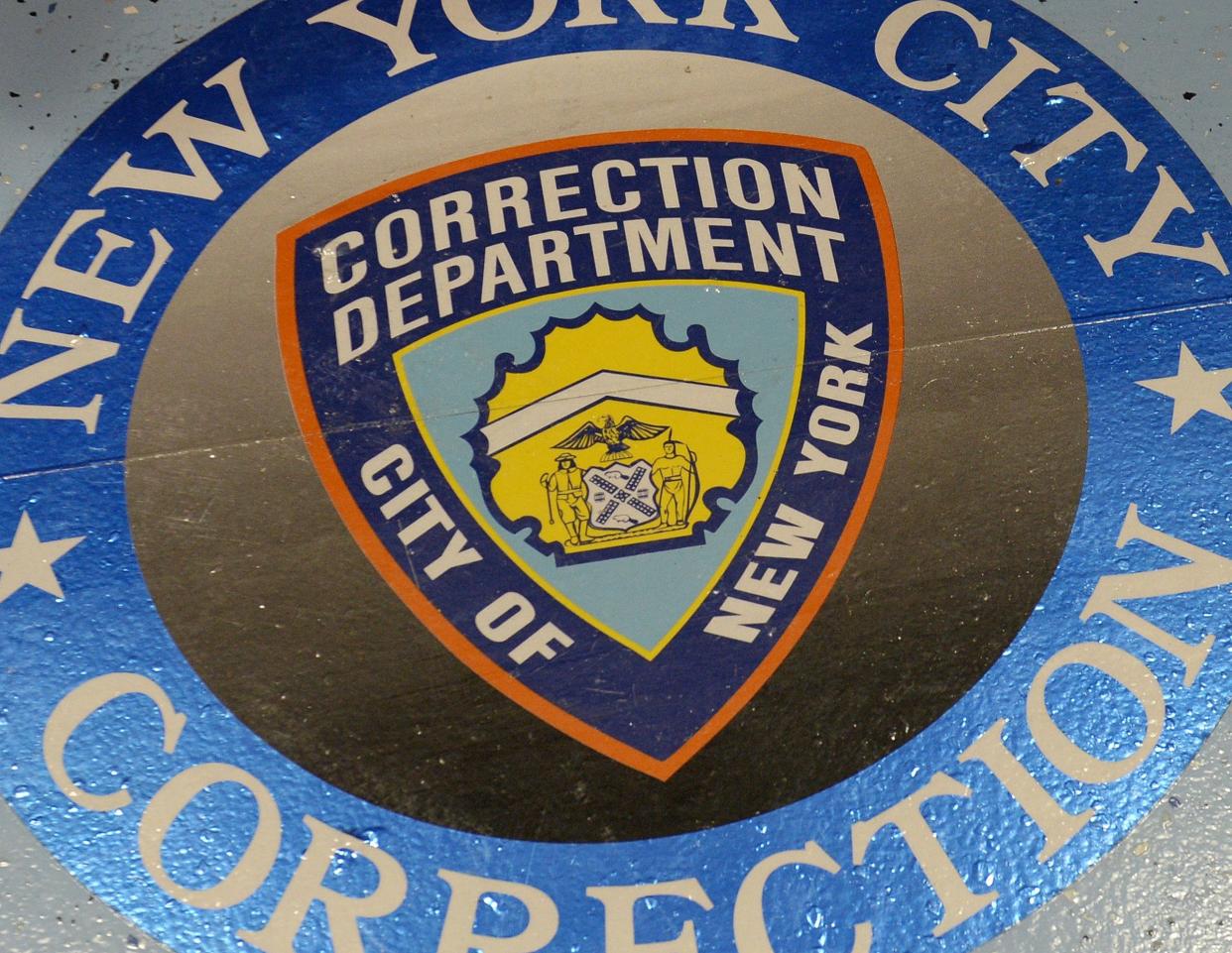 The Department of Corrections seal is pictured on the floor of a cell block on Rikers Island. 