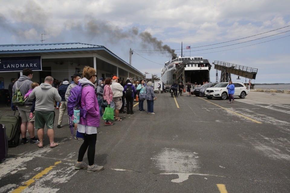 The first vehicles and passengers come off the S.S. Badger after its first sail of the season from Ludington, Michigan, to Manitowoc on Friday, June 12, 2020.
