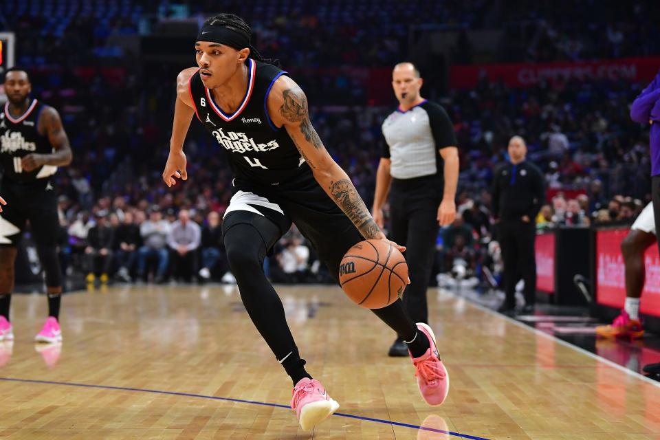 Dec 15, 2022; Los Angeles, California, USA; Los Angeles Clippers guard Brandon Boston Jr. (4) moves the ball against the Phoenix Suns during the first half at Crypto.com Arena. Mandatory Credit: Gary A. Vasquez-USA TODAY Sports