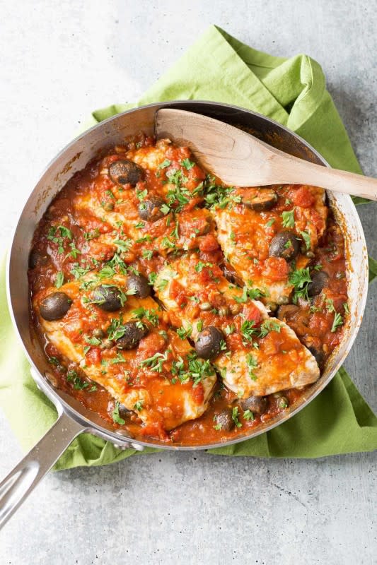 <p>My Gourmet Connection</p><p>Fish Puttanesca (Pesce Alla Puttanesca) is an easy skillet dish of mild white fish fillets simmered in a rustic Italian tomato sauce.</p><p><strong>Get the recipe: <a href="https://www.mygourmetconnection.com/fish-puttanesca/" rel="nofollow noopener" target="_blank" data-ylk="slk:Fish Puttanesca;elm:context_link;itc:0;sec:content-canvas" class="link ">Fish Puttanesca</a></strong></p><p><strong>Related: <a href="https://www.yahoo.com/lifestyle/55-air-fryer-fish-recipes-140215764.html" data-ylk="slk:55 Best Air Fryer Fish Recipes;elm:context_link;itc:0;sec:content-canvas;outcm:mb_qualified_link;_E:mb_qualified_link;ct:story;" class="link  yahoo-link">55 Best Air Fryer Fish Recipes</a></strong></p>