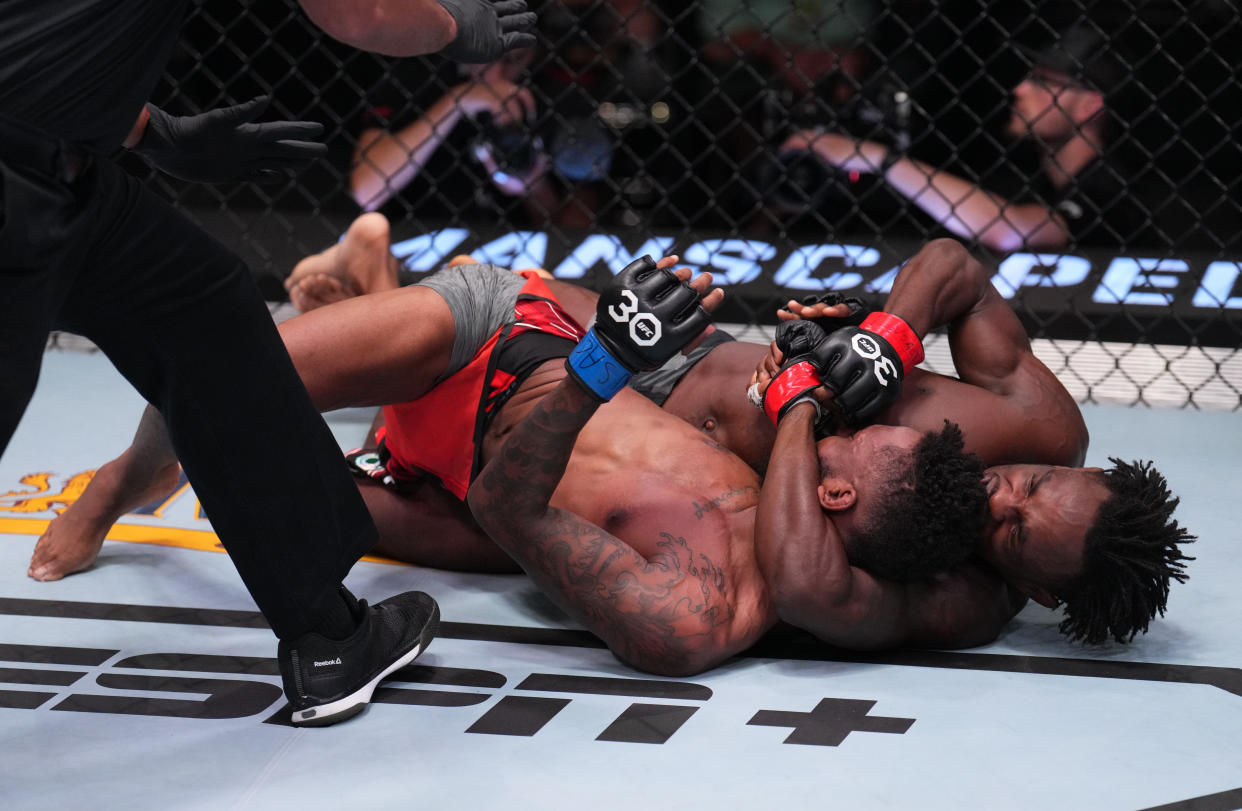 LAS VEGAS, NEVADA - AUGUST 12: (R-L) Da'Mon Blackshear secures a twister submission against Jose Johnson in a bantamweight fight during the UFC Fight Night event at UFC APEX on August 12, 2023 in Las Vegas, Nevada. (Photo by Al Powers/Zuffa LLC via Getty Images)