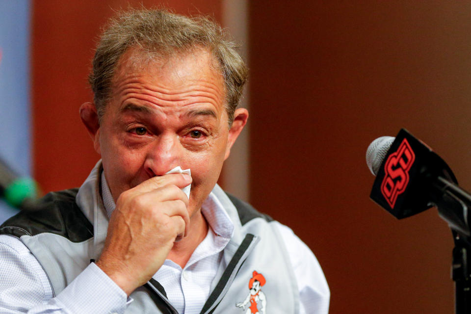 Oklahoma State wrestling coach John Smith announces his retirement during a press conference at Oklahoma State in Stillwater, Okla., on Monday, April 15, 2024.