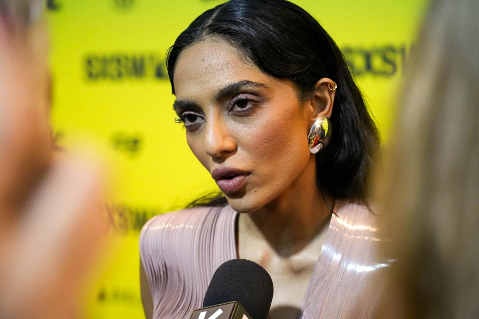 Indian actress Sobhita Dhulipala is not given much to say as a marginalized sex worker in “Monkey Man,” but her expressive eyes express volumes.