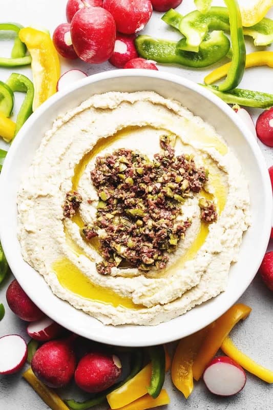 <p>Jennifer Banz</p><p>This Super Easy Keto Cauliflower Hummus recipe is the perfect choice for a great low carb dip for those special occasions or an easy meal prep for on-the-go! Smooth, creamy and dangerously addicting makes this keto friendly alternative to hummus a must-have recipe!</p><p><strong>Get the Recipe: </strong><strong><a href="https://jenniferbanz.com/cauliflower-hummus" rel="nofollow noopener" target="_blank" data-ylk="slk:Keto Cauliflower Hummus;elm:context_link;itc:0;sec:content-canvas" class="link ">Keto Cauliflower Hummus </a></strong></p>