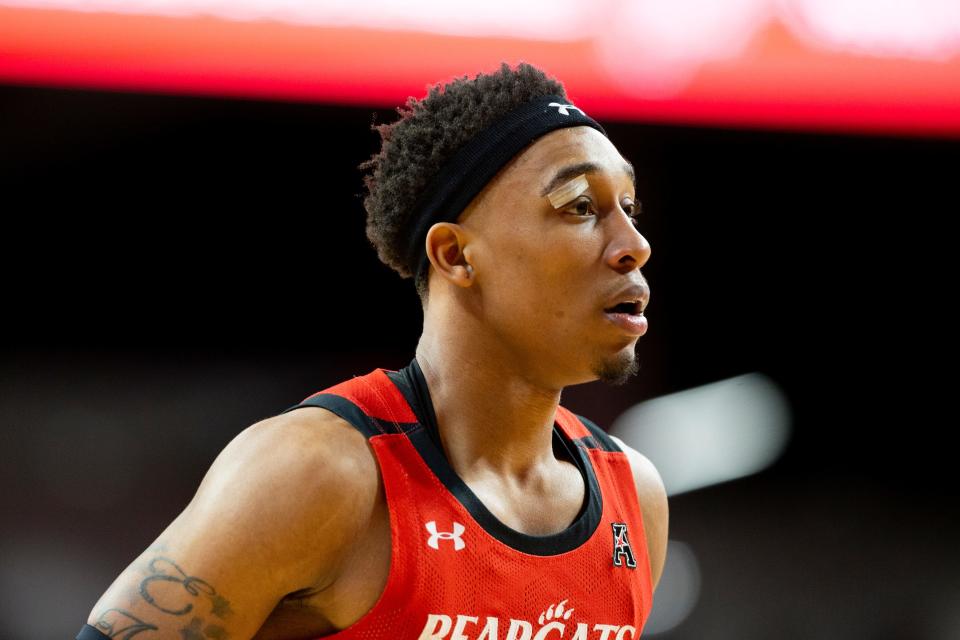 Cincinnati Bearcats guard Mika Adams-Woods (3) during the second half of an NCAA men’s college basketball game on Sunday, March 5, at Fifth Third Arena in Cincinnati, concluding the Bearcats’ regular season. The Bearcats defeated the Mustangs 97-74.