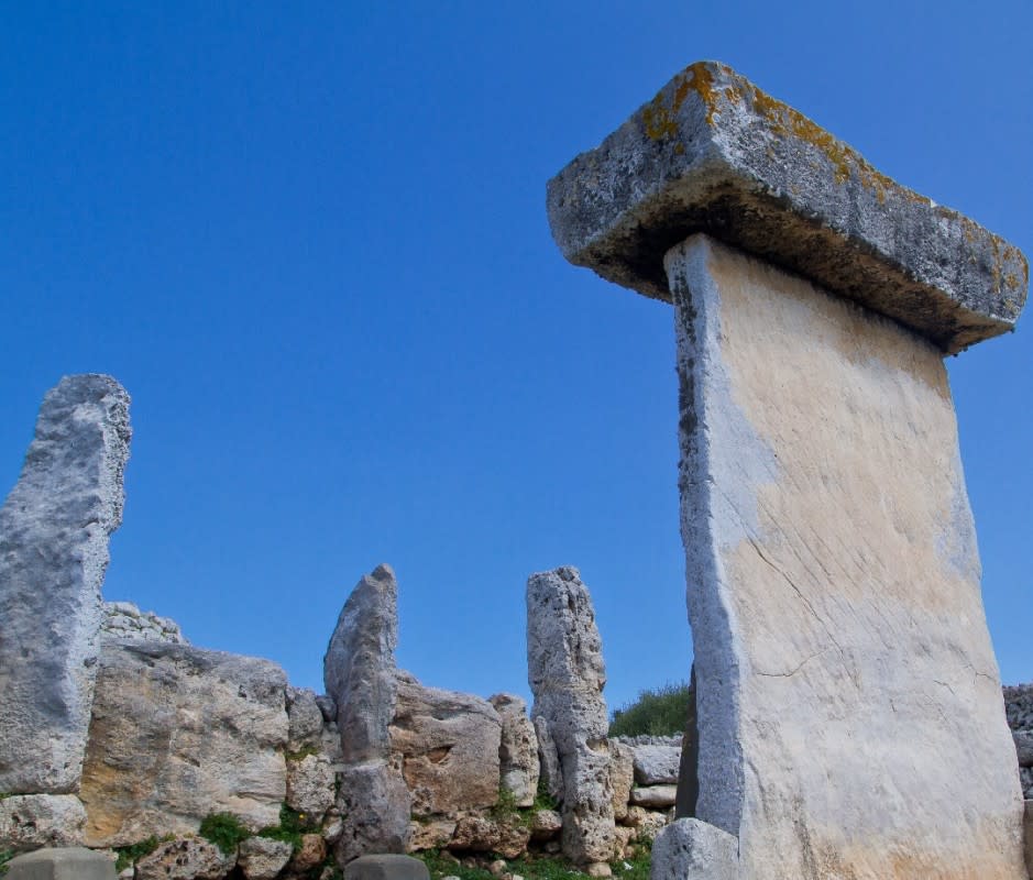 Menorca's numerous Talaiotic monuments spread across the island date back at least 3,000 years. Archaeologists call the island an "open-air museum." <p>LoPeix/Getty Images</p>