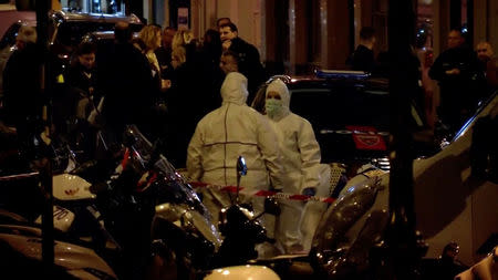 Personnel are seen at the scene of a knife attack in Paris, France May 12, 2018 in this still image obtained from a video. REUTERS/Reuters TV