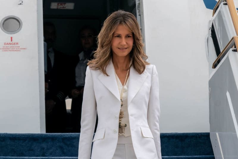 A photo released by the official Syrian Arab news agency (SANA) on 19 March 2023 shows First Lady of Syria Asma al-Assad arriving with President of Syria Bashar al-Assad (Not Pictured) to the United Arab Emirates on an official visit. -/SANA/dpa