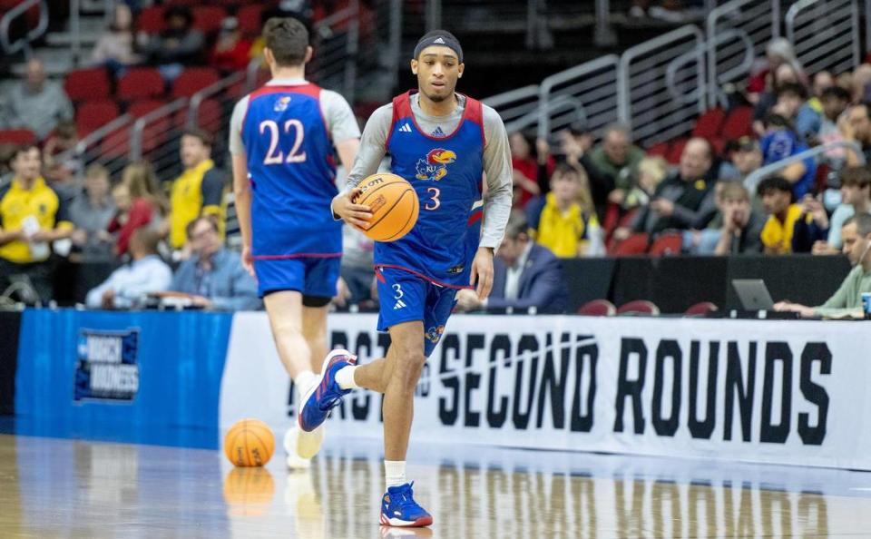 Kansas guard Dajuan Harris Jr. (3) dribbles up the court during a team shoot around a day ahead of Kansas’ first round game against Howard in the NCAA college basketball tournament Wednesday, March 15, 2023, in Des Moines, Iowa.