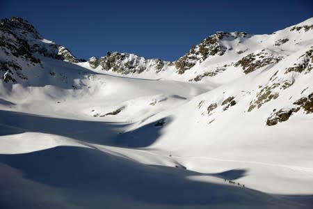 The Wider Image: Scientists race to read Austria's melting climate archive