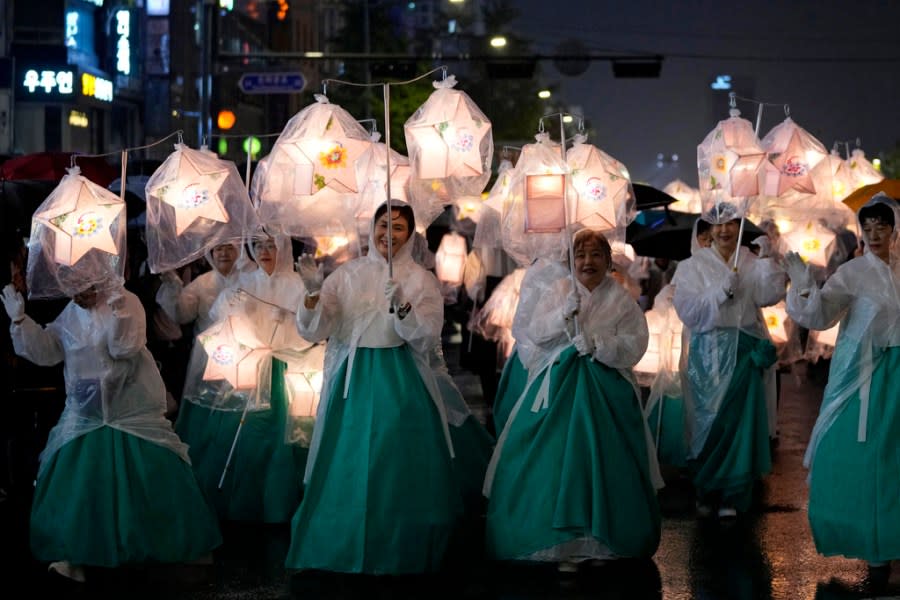 Buddhists carry lanterns and walk in a parade during the Lotus Lantern Festival, ahead of the birthday of Buddha at Dongguk University in Seoul, South Korea, Saturday, May 11, 2024. (AP Photo/Ahn Young-joon)