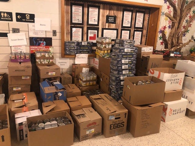 Food collected during a previous Monroe County food drive is shown. Kroger and Gleaners are collecting food at the Monroe and Brownstown Township Kroger stores this month.