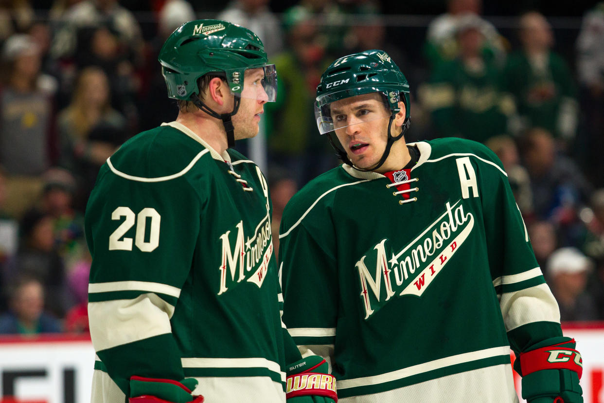 ST. PAUL, MN - DECEMBER 11: Ryan Suter #20 and Zach Parise #11 of the Minnesota Wild before the faceoff during the Central Division match up between the St. Louis Blues and the Minnesota Wild on December 11, 2016, at Xcel Energy Center in St. Paul, Minnesota. The Wild won 3-1. (Photo by David Berding/Icon Sportswire via Getty Images)