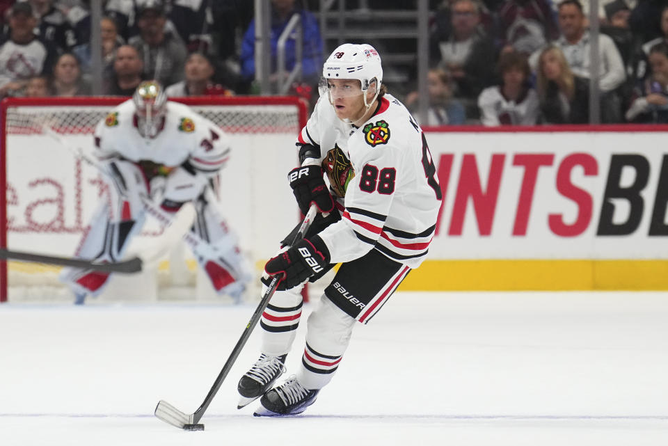 FILE - Chicago Blackhawks right wing Patrick Kane (88) skates against the Colorado Avalanche during the second period of an NHL hockey game Wednesday, Oct. 12, 2022, in Denver. The New York Rangers acquired Kane in a trade with the Blackhawks on Tuesday, Feb. 28, 2023, reuniting the star winger with former teammate Artemi Panarin and stamping the Blueshirts as a Stanley Cup contender in the loaded Eastern Conference. (AP Photo/Jack Dempsey, File)