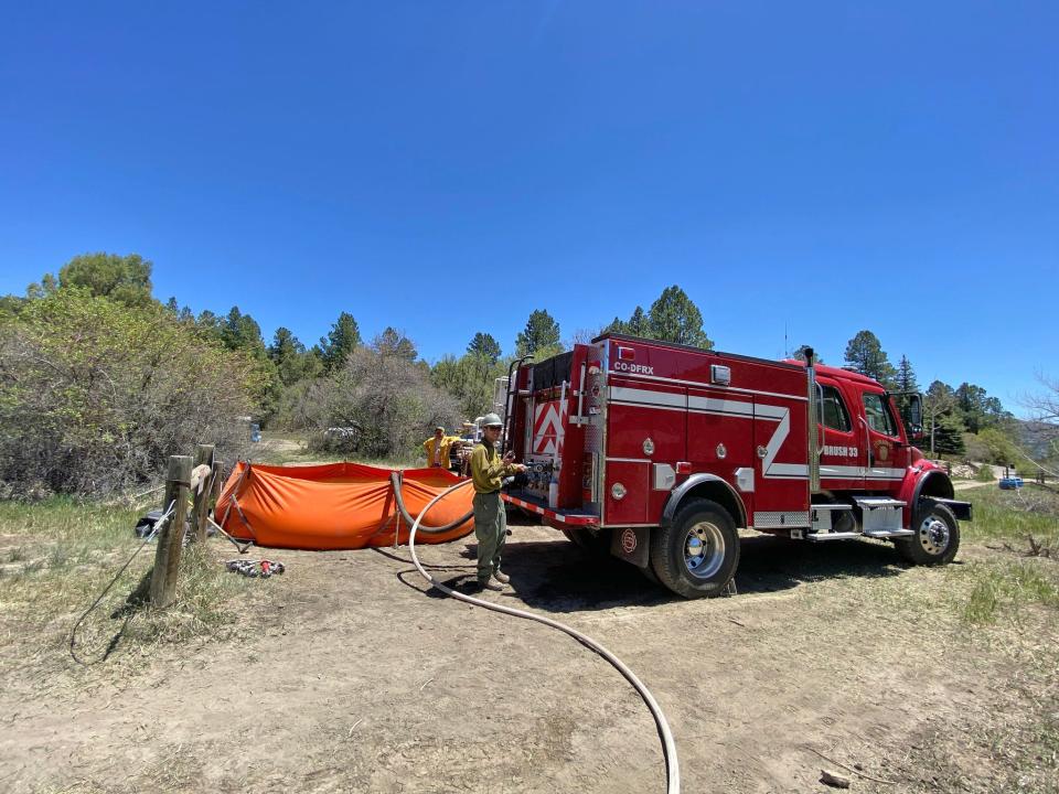 If firefighters on the containment lines of the Perins Peak Fire near Durango Colorado need water to douse wind-sparked hotspots, here's where some of it comes from. Engines and water tenders were busy during the week filling portable water tanks, known as pumpkins, to plumb the Perins Peak Fire.