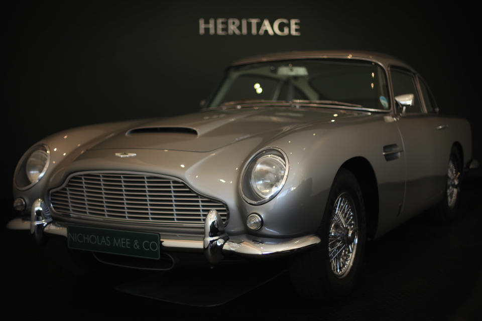 LONDON, ENGLAND - FEBRUARY 01:  An Aston Martin DB5 sits in the new 'Heritage' Showroom' in Hammersmith on February 1, 2012 in London, England. The showroom is the UK's first high street 'Heritage' showroom specialising in vintage and classic Aston Martin cars, and opens to the public on February 2, 2012.  (Photo by Dan Kitwood/Getty Images)