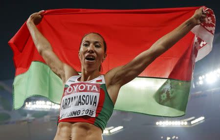 Marina Arzamasova of Belarus reacts after winning the women's 800m event during the 15th IAAF World Championships at the National Stadium in Beijing, China August 29, 2015. REUTERS/Lucy Nicholson