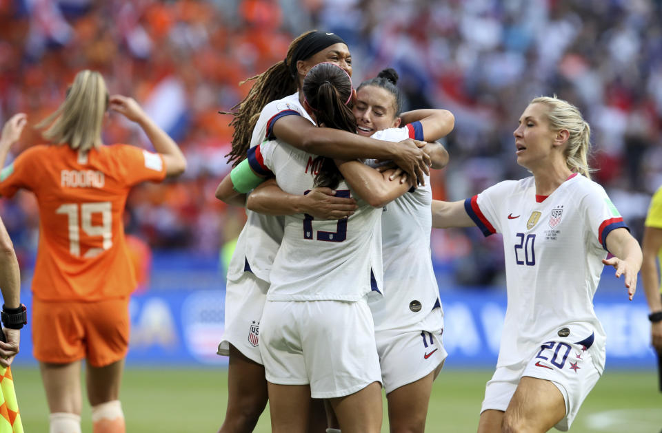 US players celebrate at the end of the Women's World Cup final soccer match between US and The Netherlands at the Stade de Lyon in Decines, outside Lyon, France, Sunday, July 7, 2019. US won 2:0. (AP Photo/David Vincent)