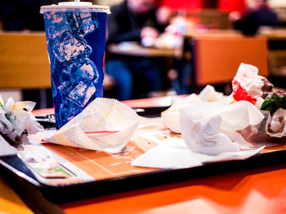 fast food messy trash tray