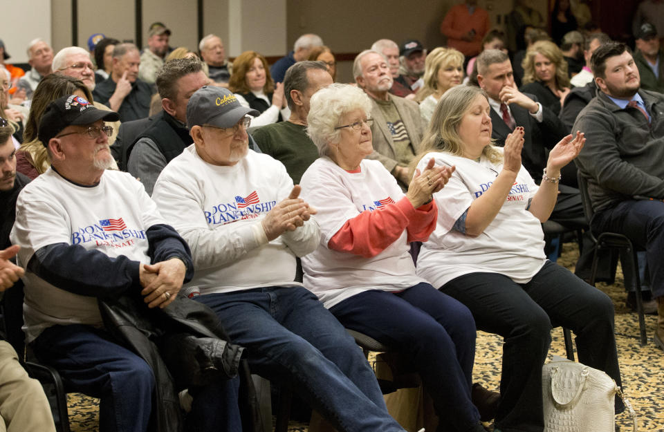 Supporters of former Massey CEO and West Virginia Republican Senatorial candidate, Don Blankenship, applaud during a town hall to kick off his campaign in Logan, W.Va., Thursday, Jan. 18, 2018. The onetime coal businessman will face U.S. Rep. Evan Jenkins and West Virginia Attorney General Patrick Morrisey in the May 8 GOP primary. (AP Photo/Steve Helber)