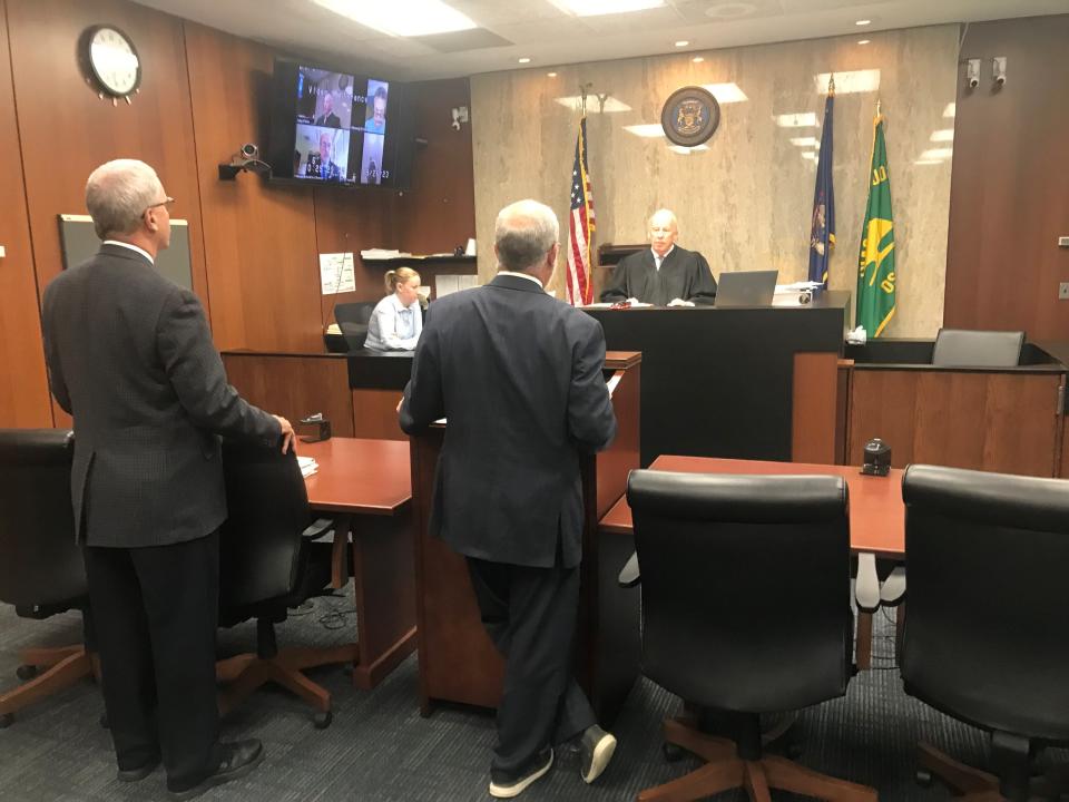 Lawyers and Oakland County Probate Judge Daniel O'Brien listen as the son of ailing ex-Detroit Lions star Lem Barney, Lemuel Barney III of Houston, Texas, says via Zoom that he wants to be reinstated as his father's guardian, at a hearing in Pontiac on Sept. 26, 2023. Former Detroit mayor Dave Bing, also on the Zoom conference, said he favored reinstating the son. But the senior Barney's guardian, attorney Jon Munger of Clarkston, reminded O'Brien of problems with Barney's son when he was co-guardian with Bing.