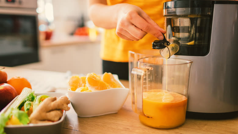 woman making fresh juice 